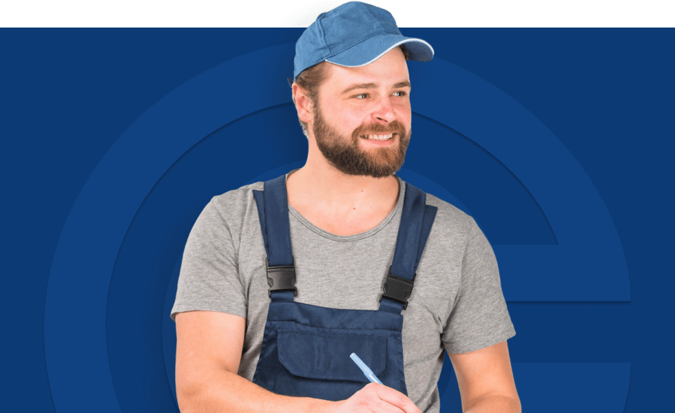 Monteur In Arbeitskleidung Mit Cap